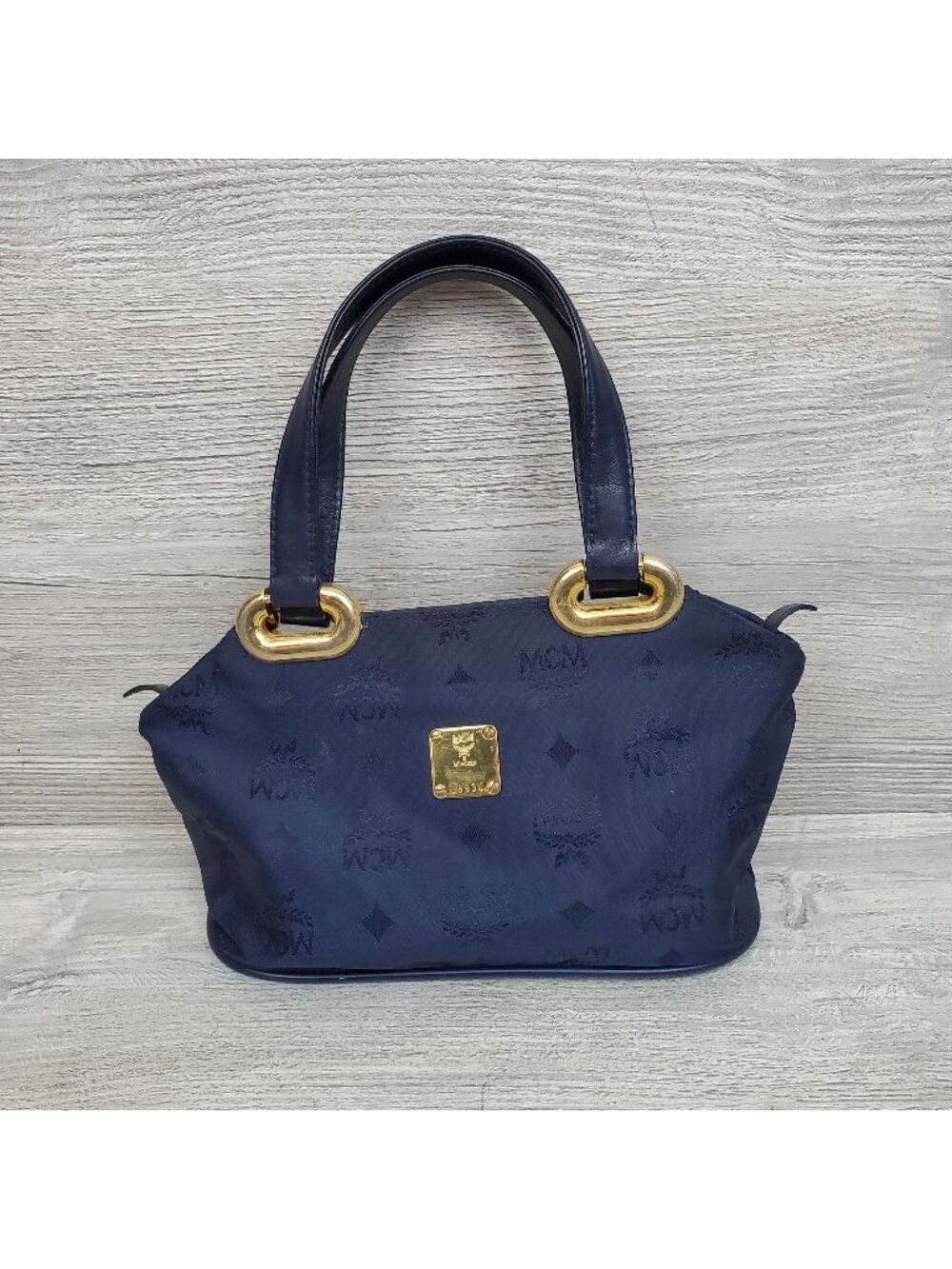 MCM monogrammed nylon mini handbag, navy and gold
